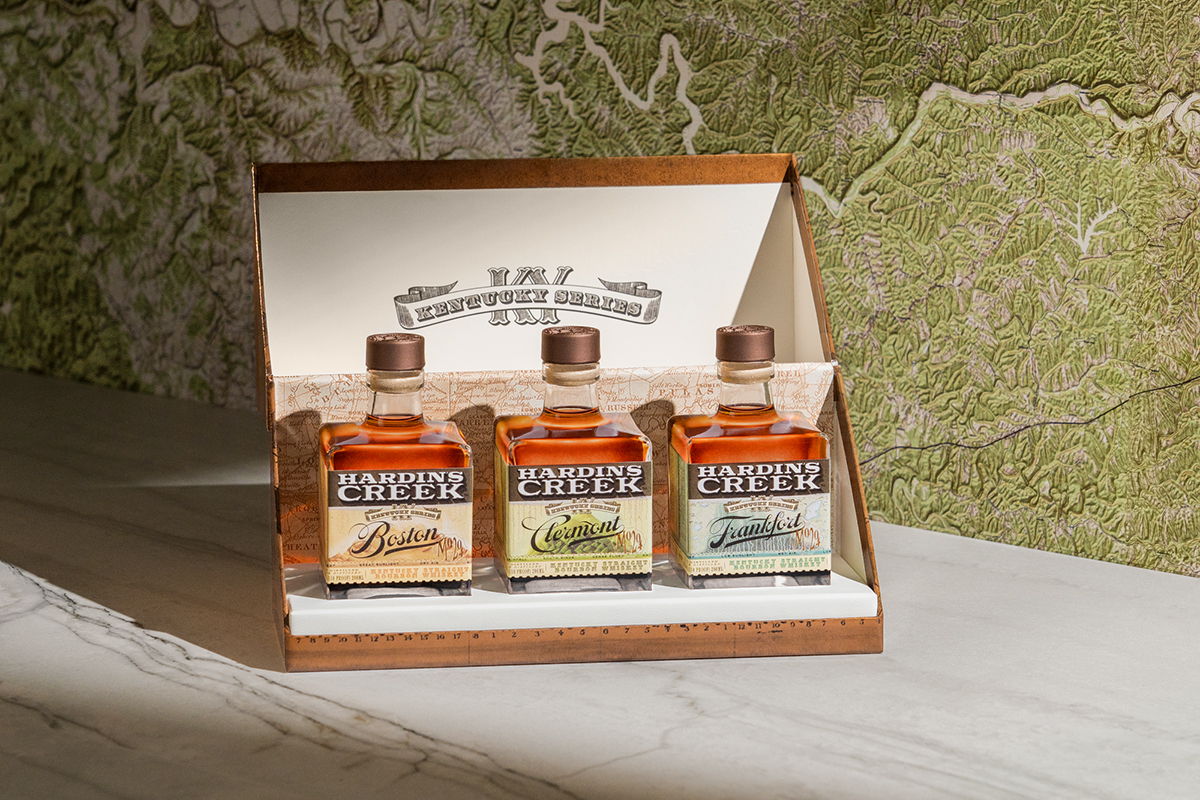 The Kentucky Series Trio, a gift set tri-pack of 17-year-old bourbons distilled using the same mash bill, showcases how microclimates and diverse landscapes influence flavor. Crafted by James B. Beam Distilling Co.