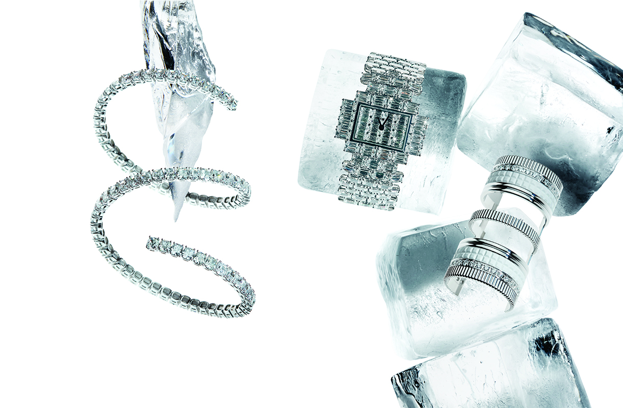 A flexible cushion cut bangle in white gold and diamonds spiraled around an icicle, a boutique collection watch covered in geometric shaped diamonds wrapped around an ice cube, and a hair accessory with white gold, diamonds and ceramic placed among ice cubes.