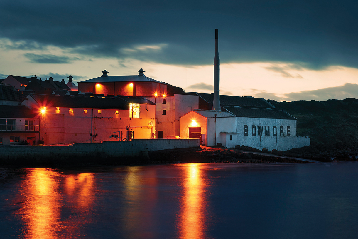 Night view of the exterior of the Bowmore Distillery on the Isle of Islay, Scotland.