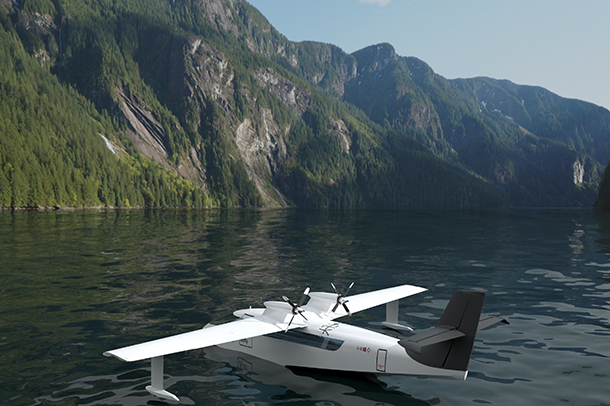 A white seaplane parked on a body of water. There are mountains in the distance.