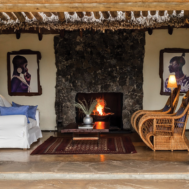 Sitting area with African artwork on wall