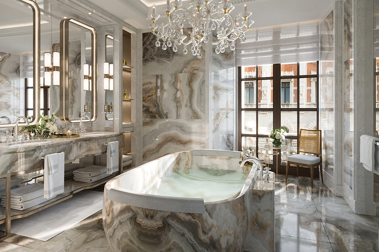Large ultra luxurious marble bathroom of hotel suite with tub, double sinks, crystal chandelier and floor to ceiling windows