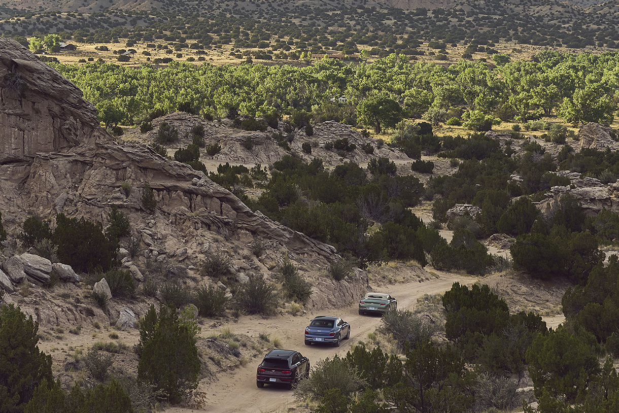Bentley Flying Spur, Continental GT, and Bentayga SUV traveling on an off-road trip through New Mexico