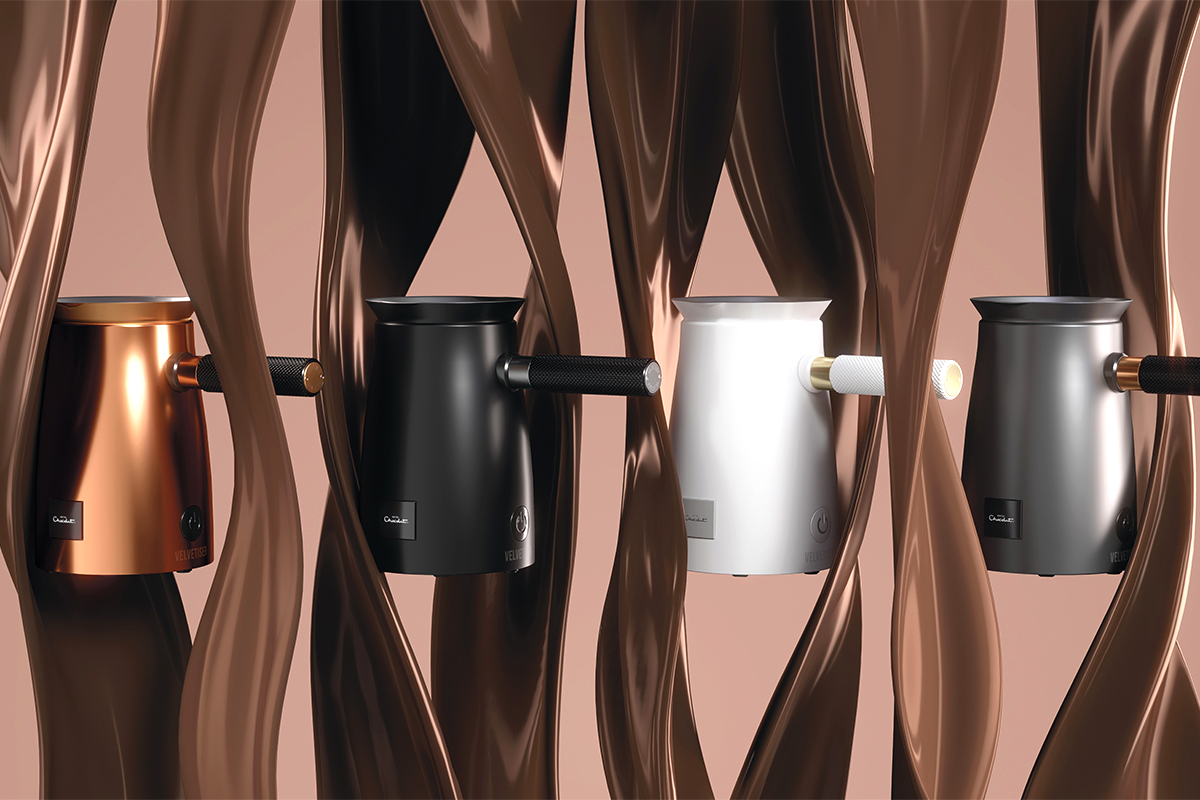 Four gourmet hot chocolate machines in black, gray, copper, and white that have a chic, stylish and modern design.