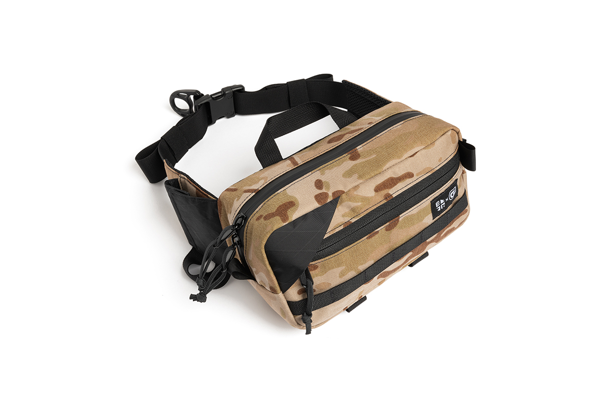 Grayl BottleLock Hip Pack in camoflauge print. The pockets provide ample storage space and can hold bottles as large as 16 ounces.