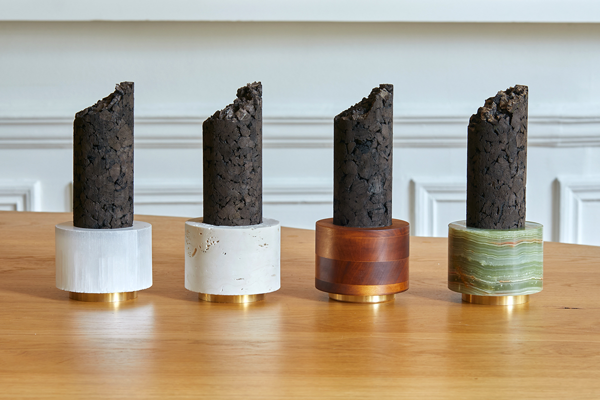 Sophie Dries created Olfactory Column for Maison D’ORSAY. The column consists of a cork cylinder that sits in a base of a stone. The cork is sprayed with fragrance. 