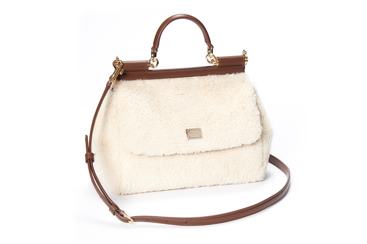 Dolce & Gabbana cream colored faux fur and calfskin Sicily bag with a logo tag featuring two metal plating finishes.
