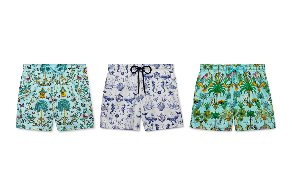 Swim trunks featuring patterns inspired by imagery from global destinations, such as palm trees, parrots, whales, seashells, sailboats, seahorses, and butterflies.