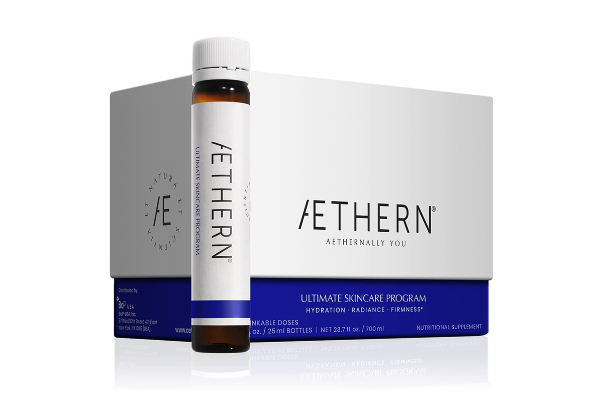 A clear, glass bottle of Aethern Advanced Skin Beauty Program, a liquid supplement. 