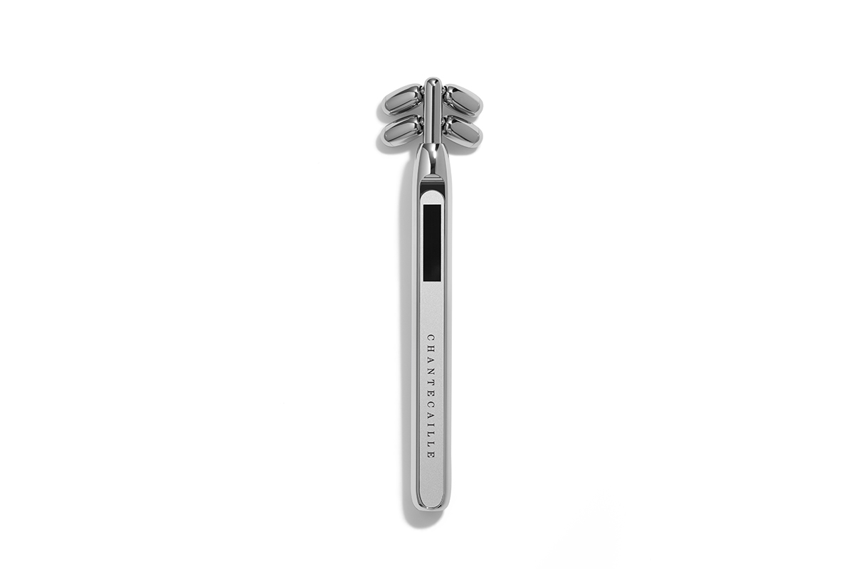 A silver Chantecaille Advanced Bio Lifting+ Massage Tool sits on a white background.